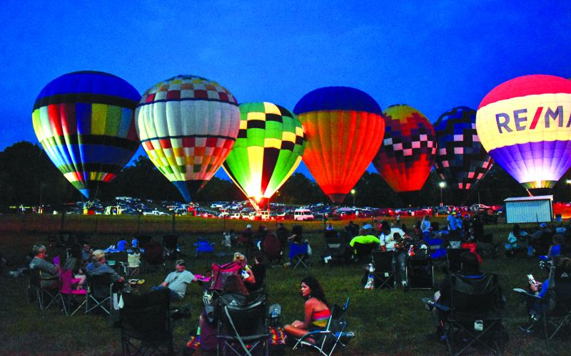 Balloon and Tunes glow event