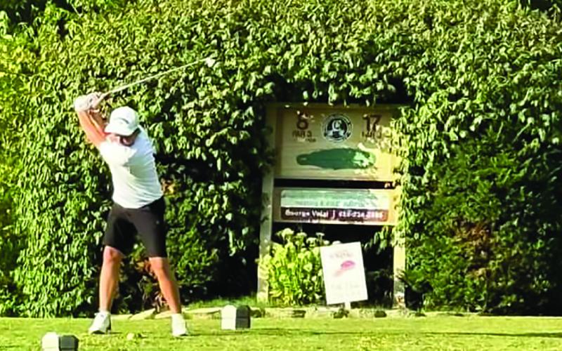 Brantley Brown tees up for a nice drive. Photo by Heather Brown.