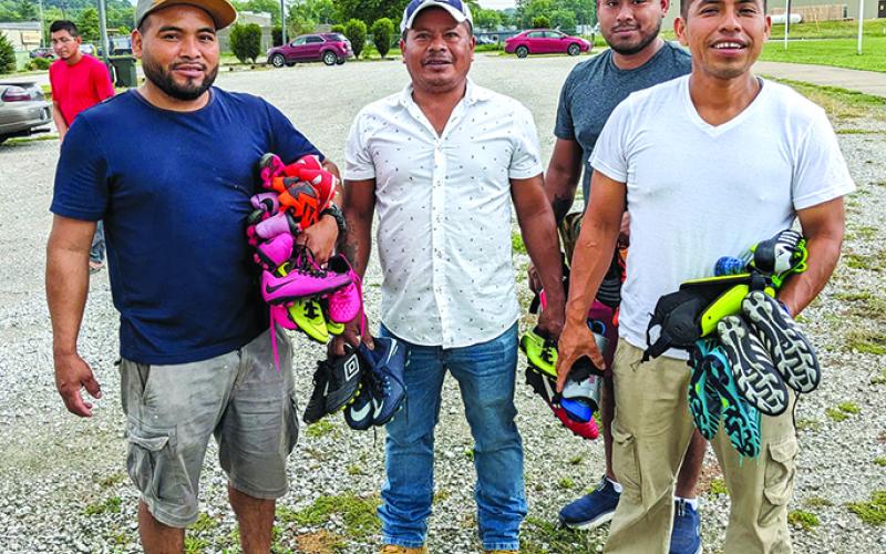 Summer workers will return home with cleats. Photo from Tammy Spicer.