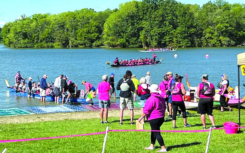 Dragon boats take to the water at A.J. Jolly Park. Photo by Nila Harris
