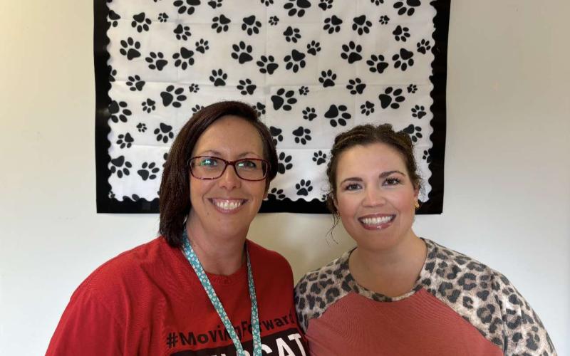 Head coach Brandi Schmidt, left, and assistant Ashley Hutchison named new PCHS Cheer coaches.