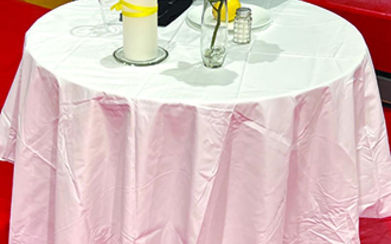 A table was set in remembrance of the sacrifices of the men and women prisoners of war and those missing in action.