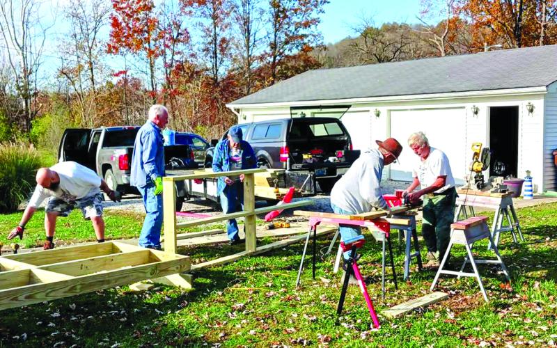 Lions working the community service project include: Ron Miller, Bob McGinnis, Herman Schack, Boo Singleton, Barth Johnson, and Joel Nahari. Photos by Nahari