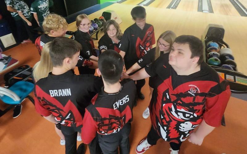 The Pendleton County bowling team gathers for some final instructions before taking on Bishop Brossart at Southern Lanes in Alexandria on November 22.  Photo provided by Rhonda Hutchison.