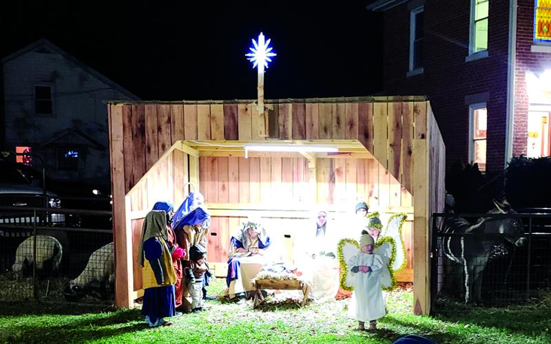 A live Nativity scene played out at Falmouth Christian Church after the parade, with sheep, shepherds, a donkey, angels and, of course, Joseph, Mary and Baby Jesus.