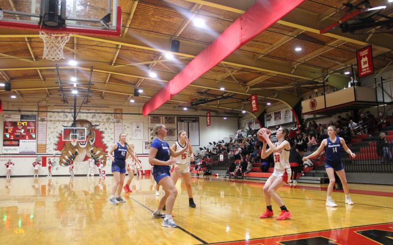 Sophomore Hannah Spaulding spots up for a baseline jumper in the home win over Bluegrass United.  Photo by Sam McClanahan