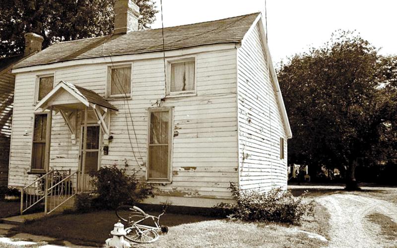 This is an archive photo of the house built at 108 Montjoy St., Falmouth, by former slave Charity Southgate after she bought the lot 1845. She also built several other houses within the block, known as Happy Hollow, for her children and grandchildren. The house was added to the National Register of Historic Places in 1983, but was demolished after the flood of 1997.