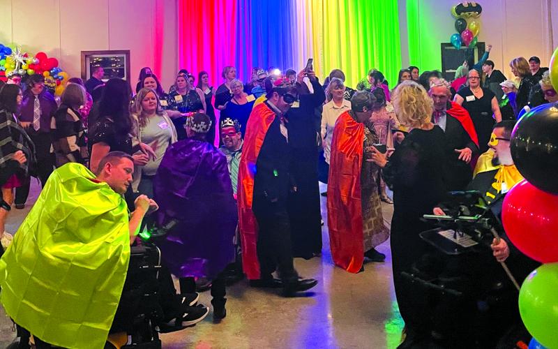 Capes swirl at Broken Arrow Farm as the superheroes dance. Photos courtesy of Abram Crozier