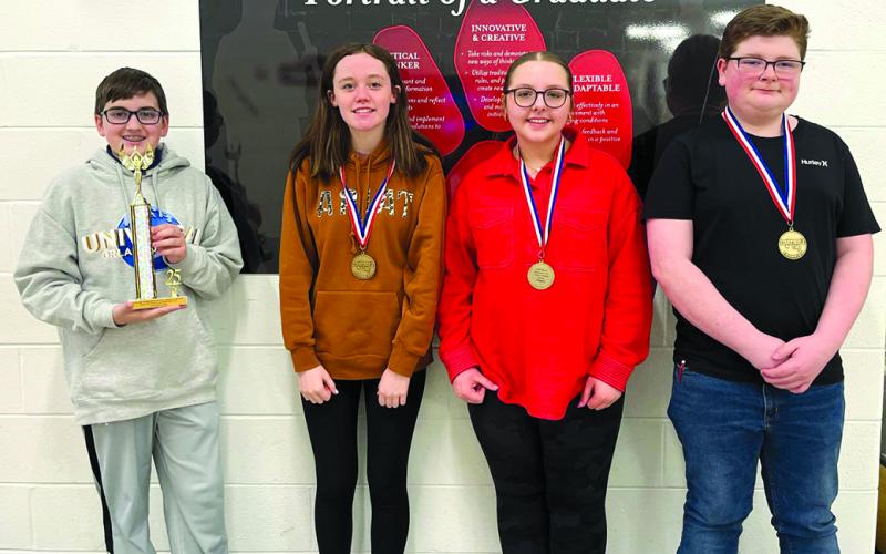 The Sharp Middle School Problem Solving Team, with their first place medals, are, from left, Jackson Jacobs, Hallie Cahill, Estelle Aulick and Carter Dunn. Photo courtesy of Cassandra Jacobs.