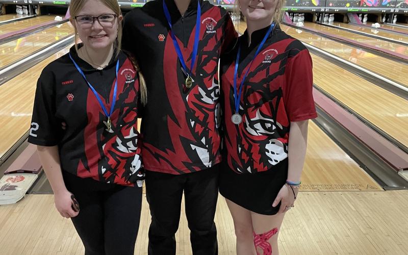 PCHS Bowling team members Kree Brewer, Kyan Brewer, and Maddie Marshall will represent the school at the state tournament this week. Photo provided by Rhonda Hutchison.