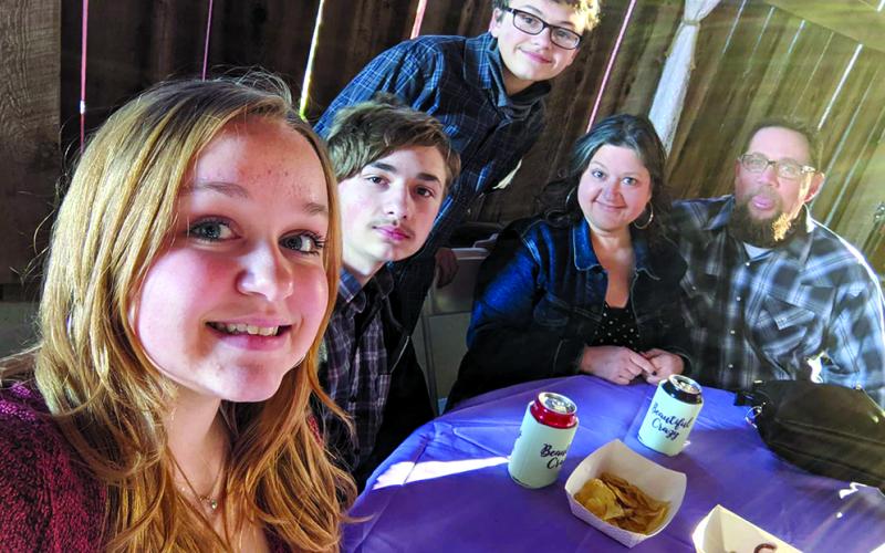 Ovarian cancer patient Miranda Geers of the Falmouth area enjoys time with her family, from left, daughter Jeanna Craig, sons Jacob and Joshua Craig, Miranda, and husband Andy. Photo courtesy of Miranda Geers.