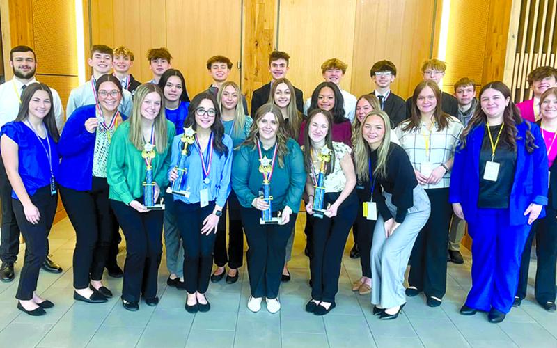 Twenty-six Pendleton County High School DECA students presented projects at the DECA state conference March 3 in Louisville. Eighteen of the 26 advanced to the second-round competition, and six students will be traveling to Disney World next month to compete at the DECA International Career Development Conference. Photos courtesy of PCHS teacher and DECA sponsor Haley Slover.