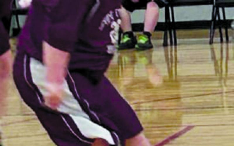 Sam Bryant of Falmouth grooves with a celebratory dance after scoring a basket during the Special Olympics state basketball tournament this month in Louisville. “His celebration dances are the best,” coach Beverly Bass said.