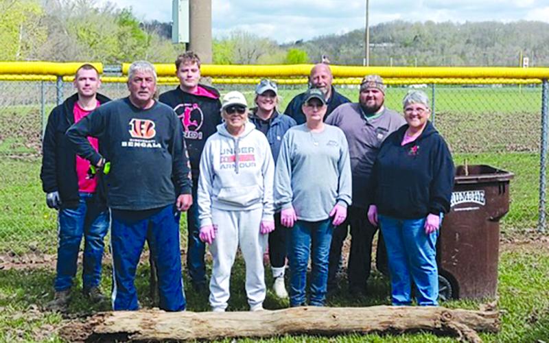 The cleanup crew included, back row from left, Anthony Barlow, Tevin Mudd, Sadie Turner, Randy Wells and Dustin Robbins, and front row, Ronnie Mudd, Selena Mudd, Karen Davis and Janice Polley.  Photo by Sam McClanahan.