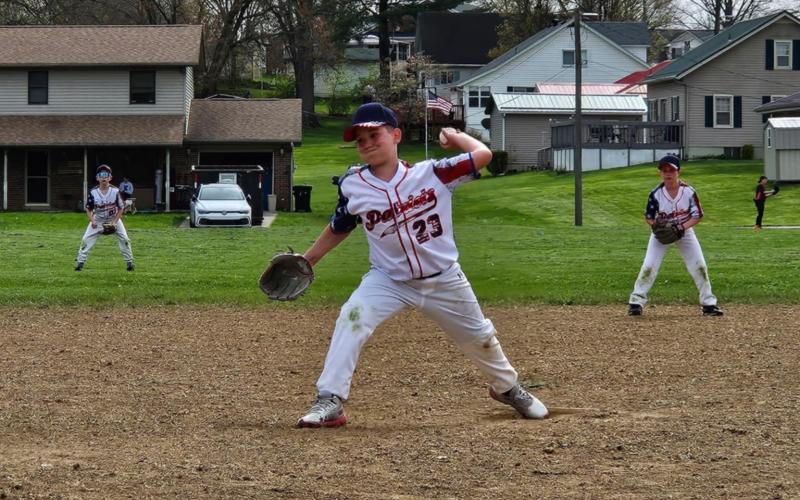 Patriots player Blake Price tries to strike out an opposing player. Photos provided by Luke Price.