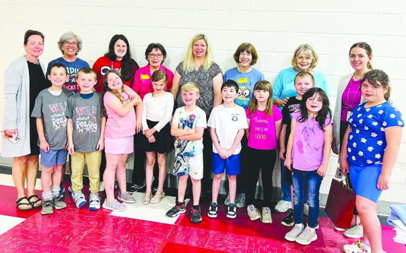 One to One mentors at Northern Elementary include, back row from left, organizer/media specialist Tina Record, Coach Penny Wheatley, teacher Maddie Flaugher, toach Eleen Utz, teacher Jennifer Redden, Coach Carole Bowen, Coach Diane Herrman, and Teacher Olivia Schultz; and front row in no particular order, Sunny, Gabe, Raylynn, LeeAnn, Vincent, Kylie, Caster, Lilly, Kierra, and Jackson.