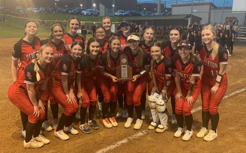 The Ladycats pose with their district runner-up trophy following a 3-1 loss to Harrison County in the championship game. This was the program's sixth district title game appearance since 2018. Photo by Jon Wirth.