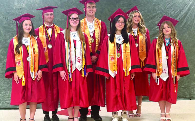 During Pendleton County High School commencement ceremonies May 23 at the high school, the top academic graduates of the Class of 2025 gathered for a photo. From left are Hannah Thomas, Bryant Brown, class salutatorian Emily Best, valedictorian Kade Carr, Annie Lin, Jayla McIlvain and Emily Fultz. Missing from he photo is Jacob Peluso.