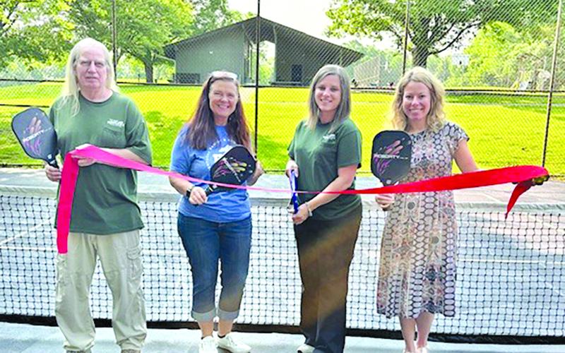 A ribbon cutting took place at Kincaid Lake State Park  recently to celebrate the debut of new Pickleball courts. Pictured left to right: Bucky Field, Kenna Knight, Meredith Crawford, and Natasha Trauth.