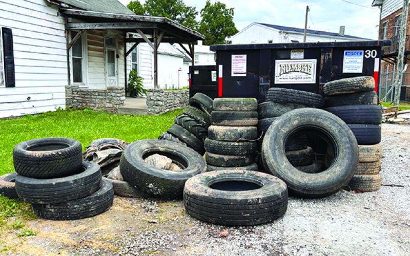 Tires collected from roadways and pulled from the river are stacked for recycling. Collected Saturday were 36 passenger tires, plus three on rims, four semi tires, 1,000 pounds of scrap metal, 1,250 pounds of mixed recycling, plus 1,250 pounds trash for the landfill.