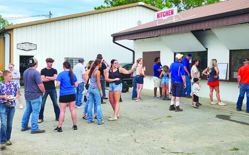 What’s the fair without fair food. Hungry patrons line up at one of a variety of choices for eats. Photo by Burton Cole.