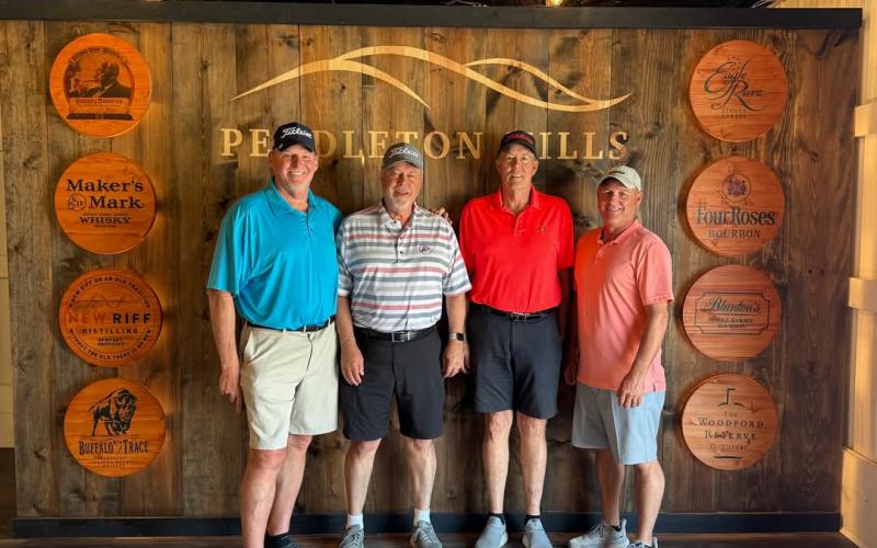 The "Golfing Kentucky For a Cure" foursome of Al Starnes, Mike Wright, Mike McGill and Shawn Williamson pose at Pendleton Hills before playing their round on June 4. Photo courtesy of the Pendleton Hills Facebook page.