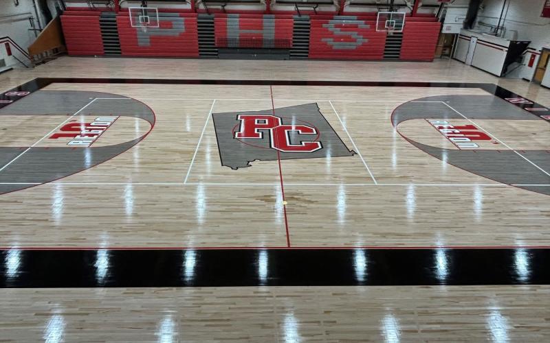 New additions include the 10th Region logo just inside of both free throw lines plus an outlined shape of Pendleton County with the initials 'PC' at mid-court.
