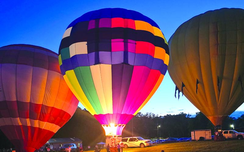 Balloons and bands and cars, oh my!