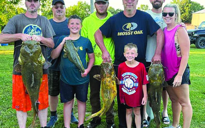 It’s a family fishing affair with Jory Wilson, Ray Parsons, Memphis McClanahan, Tanner Pugh, Darell Pugh, Memphis McClanahan, Blaine McClanahan, and Kelsie McClanahan. Their haul earned them 180 pounds of fish. Photo courtesy of Kelsie McClanahan