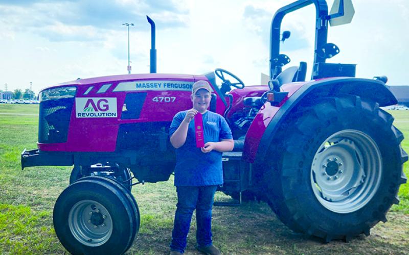 Waylon Clifton, 12, placed third in the lawn garden tractor driving contest, and fourth in the farm tractor driving contest with tractor shown here.