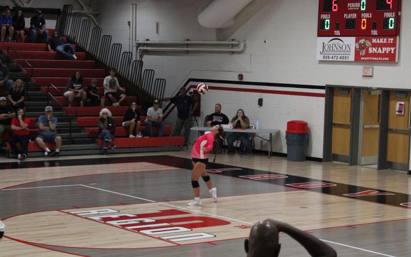 Junior Libero Kaylee Loomis serves during the Ladycats first victory of the season over Robertson County on Sept. 2. Photo by Sam McClanahan.
