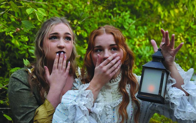 Bethany Beckett and Katie Kellar react in a scene from Kincaid Regional Theatre’s production of “The Legend of Sleepy Hollow.”