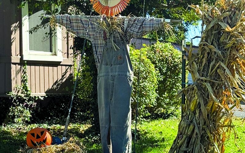 Happy Henry the fisherman has his line cast on Randy and Joy Bastin’s front yard