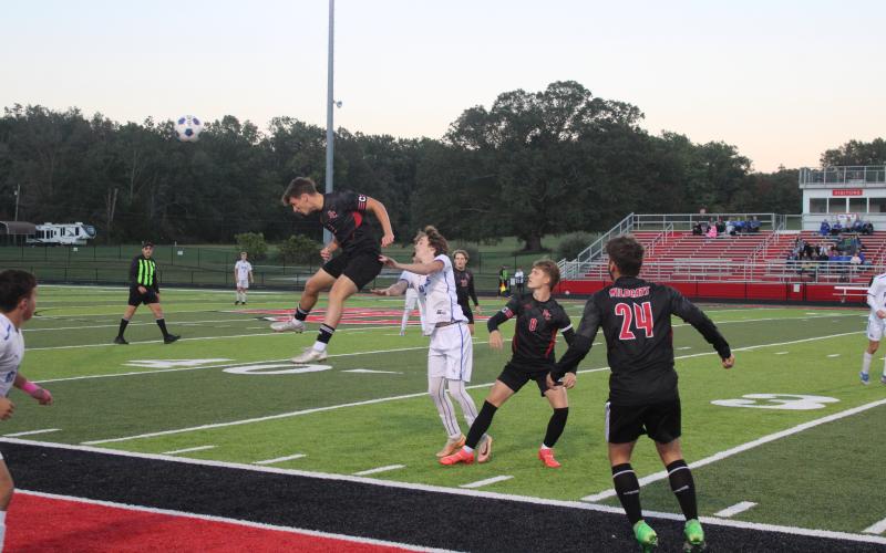 Wildcat senior Dawson Nichols goes airborne for a header during the teams district title game loss to Mason County on October 9. Photo by Sam McClanahan