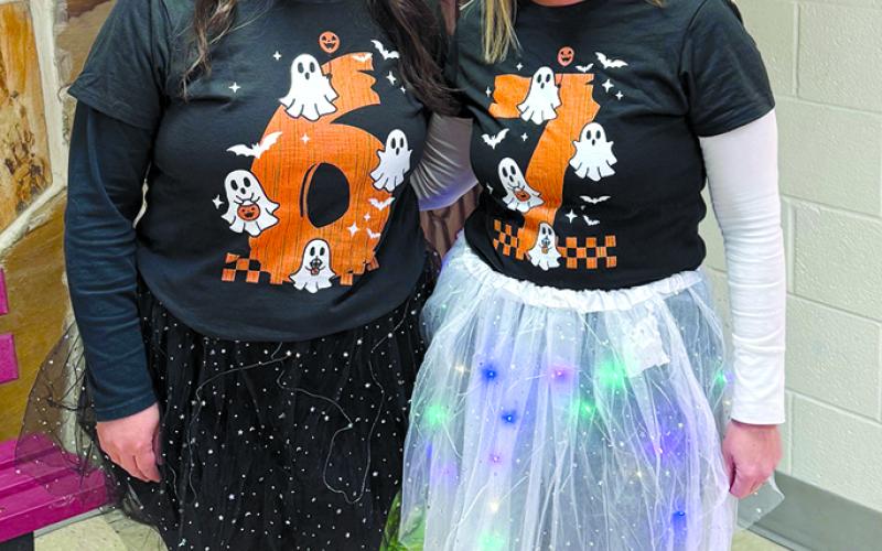 Mallory Mullins, school secretary, and Jodi Gerhardstein, counselor, went to Northern Elementary School on Halloween Day as the embodiment of one students’ current phrases, “Six-seven.” Groovy.