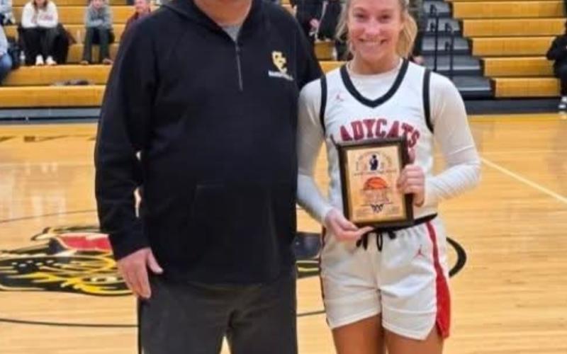 Senior Lilly Ashcraft is presented her tournament MVP honors. Photos courtesy of the PC Ladycats Facebook page.
