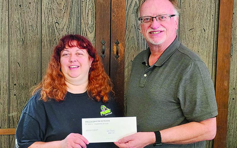 first place winner Christina Miller along with Falmouth Outlook owner/publisher Neil Belcher.