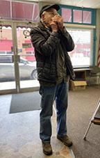 Marvin Sullivan plays his harmonica