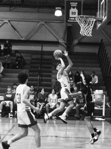 Freshman guard Dawson Nichols drives to the basket during the Wildcats home game versus Fleming County on December 6. Photo by Sam McClanahan