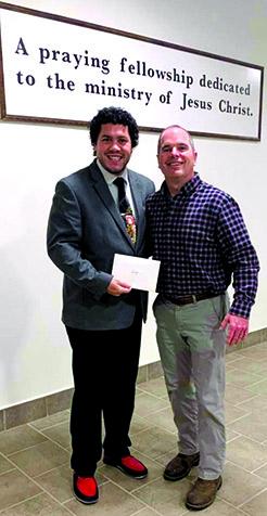 Pictured below with Brother Abram Crozier is Darling’s General Manager, Brad Eden, presenting Crozier with a check for $1,000.00 to be used by Outreach.