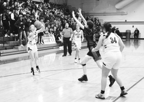 Senior Emmie Dunn goes up for a jump shot in the Ladycats' win over Robertson County. Photo by Sam McClanahan