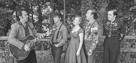 The cast of KRT's MILLION DOLLAR QUARTET shown here L-R: Nathan Roberts (Elvis Presley), Hunter Henrickson (Carl Perkins), Sarah Beth Ganey (Dyanne), Philip King (Jerry Lee Lewis), and Michael English (Johnny Cash) singing outside KRT. Not pictured are Patrick Stanley (Sam Phillips), Garette Koeninger (Fluke) and Zach Gutman (Bro. Jay Perkins).