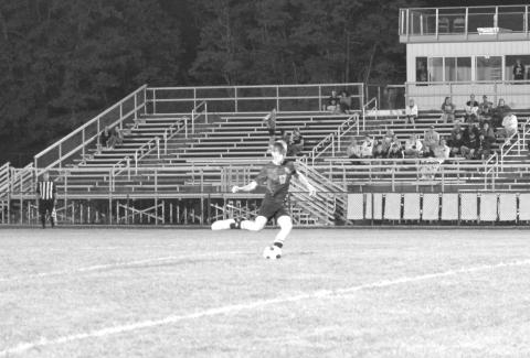 Sophomore Adam Beebe looks to score a Wildcats goal against Paris. Photo by: Sam McClanahan.