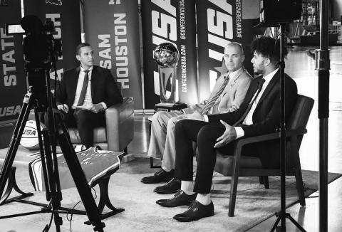 Dontaie Allen, right, along with new Western Kentucky basketball coach, Steve Lutz, center are interviewed by Conference USA about the team's upcoming season.