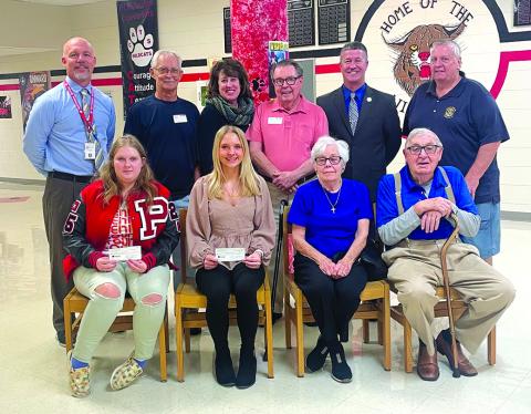PCHS principal Tony Dietrich, Rotarians Patrick Clore,  Mary Woodhead Hillemeyer, Dan Woodhead, PC Superintendent Joe Buerkley, Rotarian Darryl Ammerman, PCHS Seniors Alliyah Webster and Emily Jodrey, Rotarians Janice and Owen Collins.
