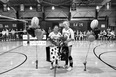 Ladycat volleyball seniors Lindsey Arkenau and Skyla Harrison were honored by the team before their home matchup with Augusta.