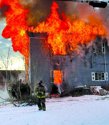 Fire destroyed a house Monday morning at the corner of Fourth and Broad Streets in Falmouth. Resident Eddie Huffman escaped the blaze but lost a dog in the fire. Last Wednesday in Butler, Noble Gabbard Jr., 47, lost his life in a house fire at 2887 River Road, Butler. Photo by Carolyn Reid. 