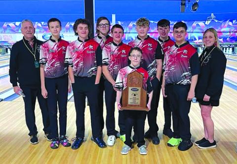 The PCHS boys bowling team are, from left, Ronnie Hutchison, Adam Straus, Chance Enzweiler, Leroy Bryan, Karson Enzweiler, Colton Webster (holding the trophy), Kyan Brewer, Braden Brann, Bradley Brann and Amber Brewer. Photos courtesy of Rhonda Hutchinson.