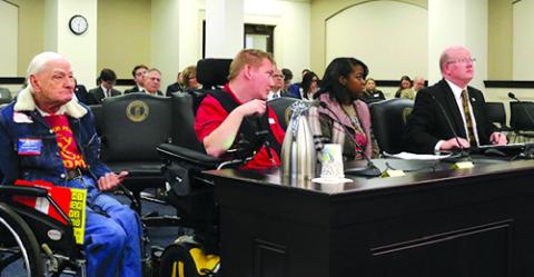Arthur Campbell Jr. of Louisville, left, and Frank Huffman of DeMossville join state Rep. Mark Hart, R-Falmouth, to testify before the House Standing Committee on State Government about rights for those whose freedoms have been limited because of disabilities. The act that aims to expand the 1986 Bill of Rights for Persons with Developmental Disabilities has been dubbed the Frank Huffman Act.