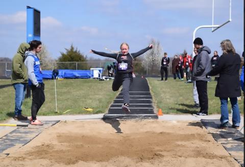 Aryanna Soden goes airborne for the track and field team during Saturday's meet in Bracken County. Photo courtesy of Jennifer Redden.